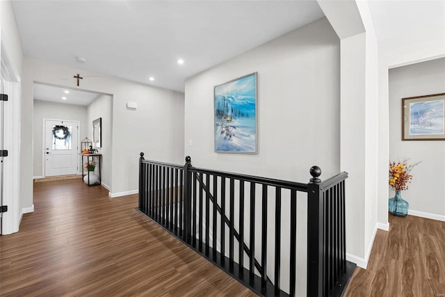 corridor featuring dark hardwood / wood-style flooring