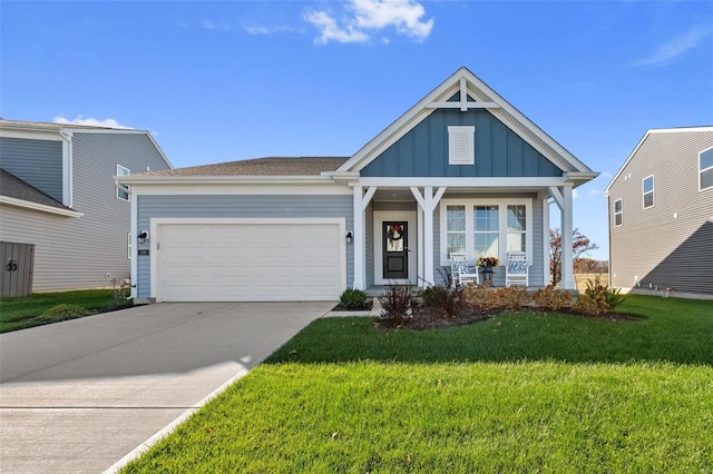 view of front facade featuring a garage and a front lawn