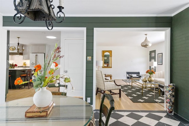 dining room with hardwood / wood-style flooring