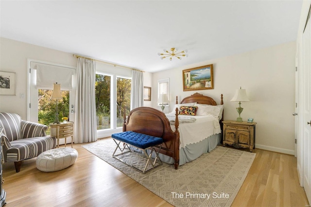 bedroom with light hardwood / wood-style floors