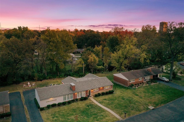 view of aerial view at dusk