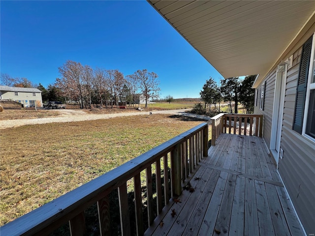 deck featuring a yard