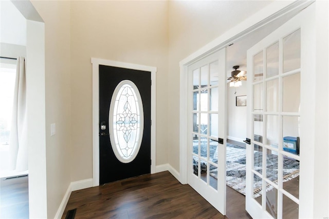 entryway featuring french doors, dark hardwood / wood-style flooring, plenty of natural light, and ceiling fan