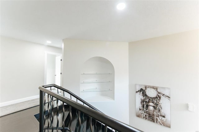 hallway with built in shelves