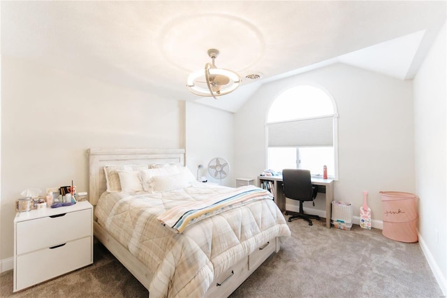 bedroom with carpet flooring and vaulted ceiling