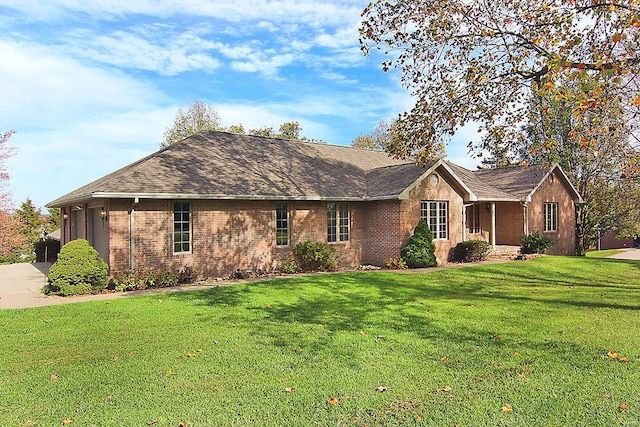 single story home with a front yard