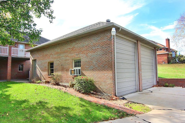 view of home's exterior with cooling unit and a yard