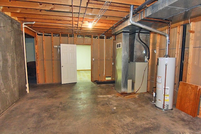 basement with water heater and heating unit