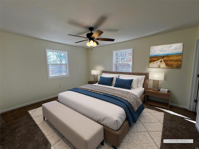 carpeted bedroom with ceiling fan