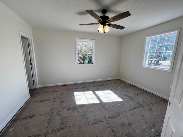 unfurnished room featuring ceiling fan