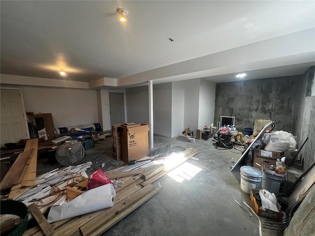 miscellaneous room with concrete flooring