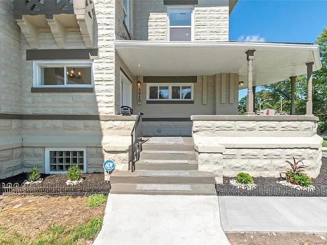 property entrance with a porch