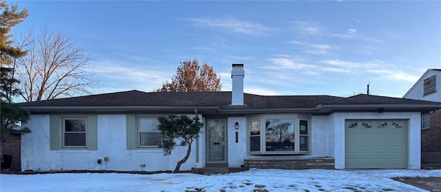 single story home with a garage