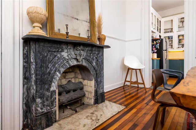 sitting room featuring wood-type flooring