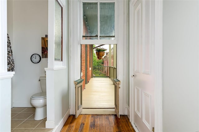 doorway with light hardwood / wood-style flooring