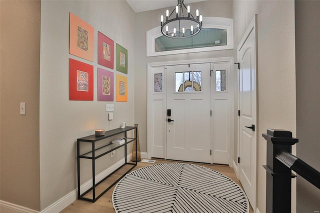 entrance foyer with an inviting chandelier