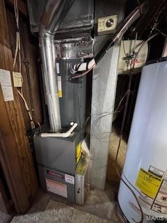 utility room featuring gas water heater