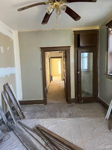 hallway featuring carpet flooring