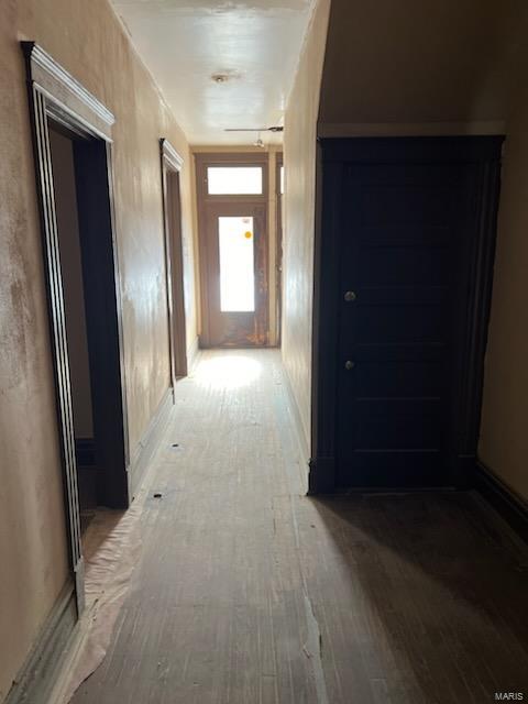 corridor featuring hardwood / wood-style flooring