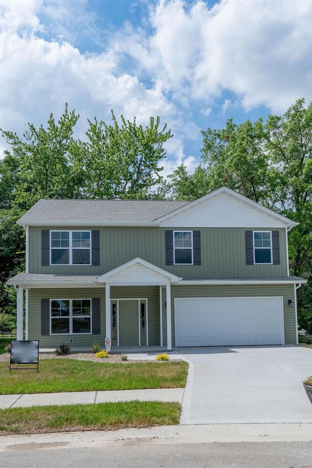 view of front of property with a garage