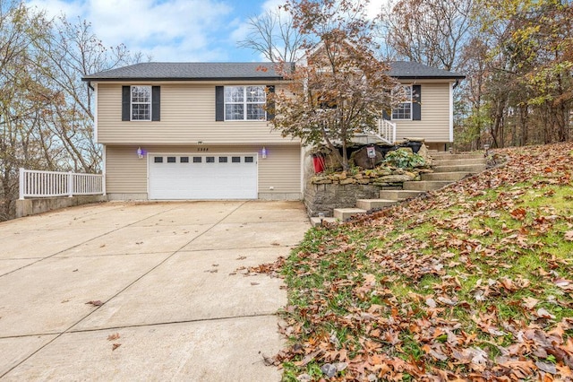 raised ranch featuring a garage