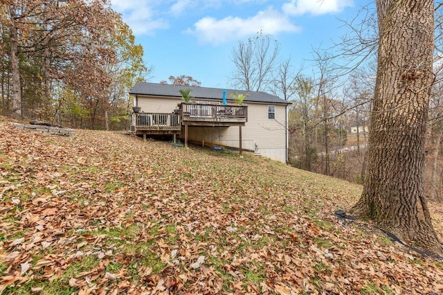 rear view of house with a deck