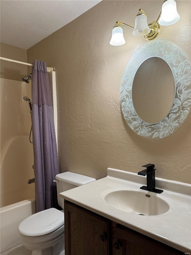 full bathroom with vanity, shower / bath combo with shower curtain, a textured ceiling, and toilet