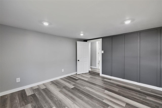 empty room featuring hardwood / wood-style flooring