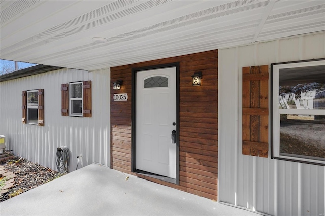 doorway to property featuring a porch