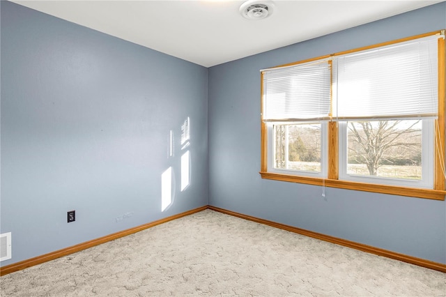 empty room featuring carpet floors