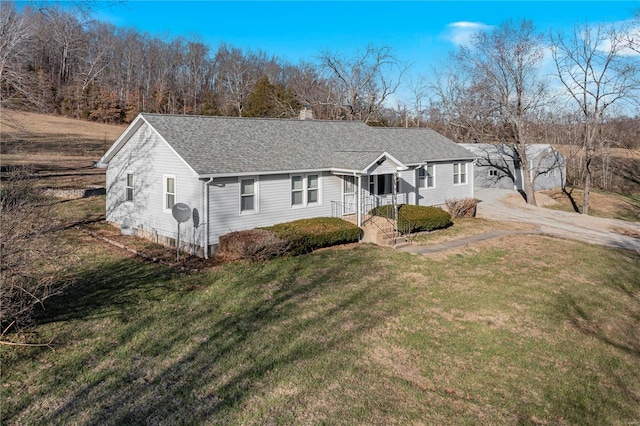 single story home with a front yard