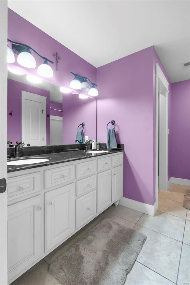 bathroom featuring vanity and tile patterned floors