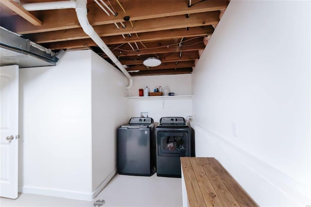 washroom featuring separate washer and dryer