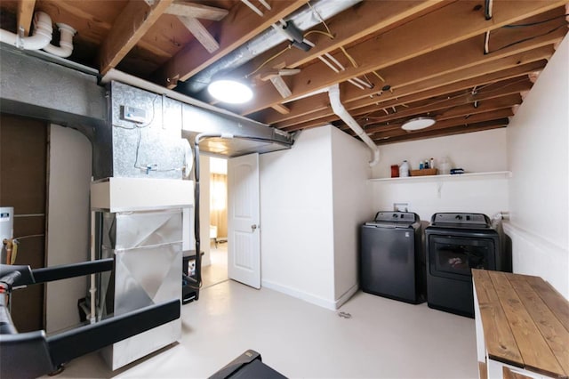 basement featuring washing machine and dryer