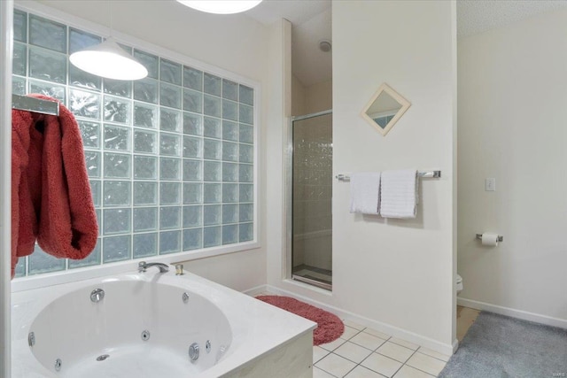 bathroom featuring shower with separate bathtub, a textured ceiling, and tile patterned floors