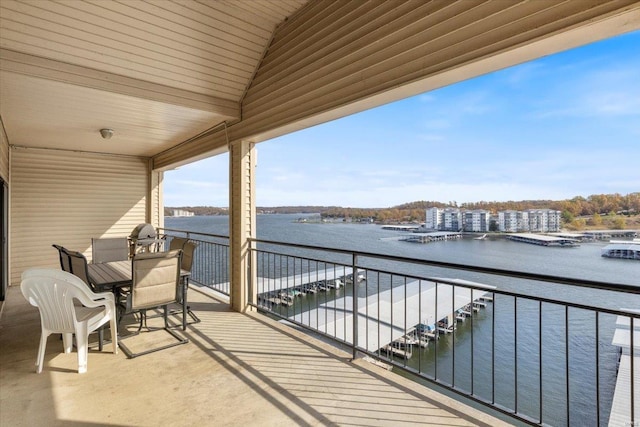 balcony featuring a water view