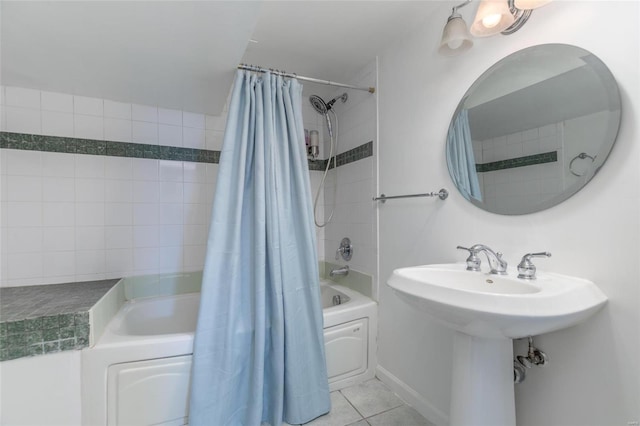 bathroom featuring tile patterned flooring and shower / bath combo with shower curtain