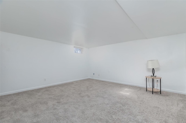 spare room with light carpet