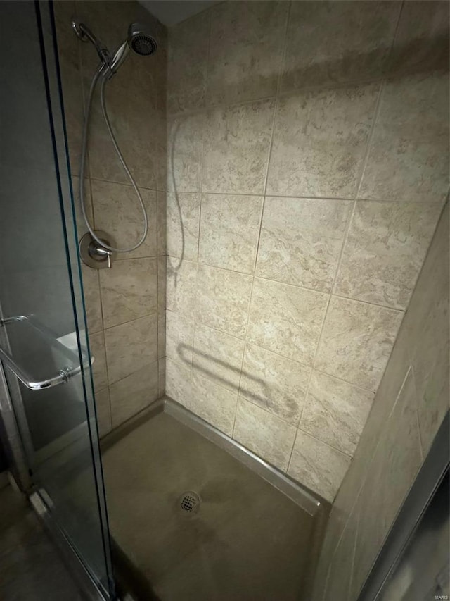 bathroom featuring an enclosed shower