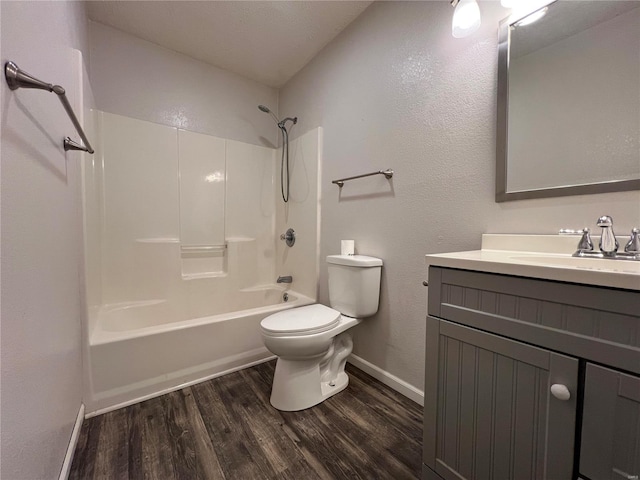 full bathroom featuring toilet, bathtub / shower combination, vanity, and wood-type flooring