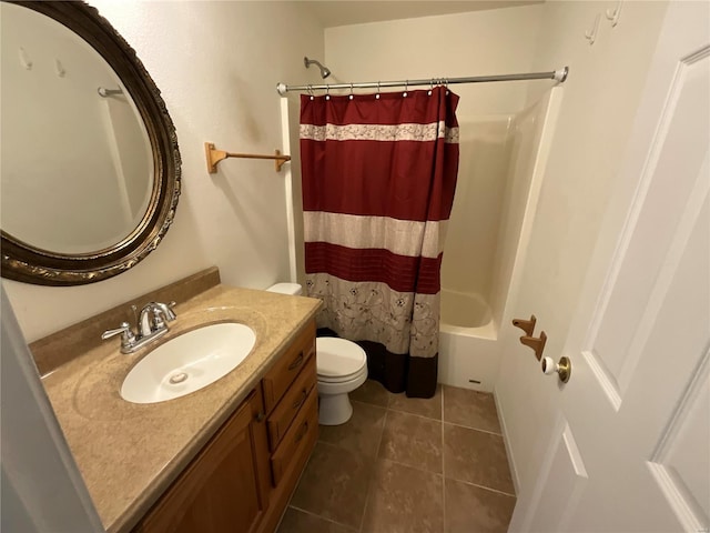 full bathroom with tile patterned flooring, shower / bath combo, toilet, and vanity