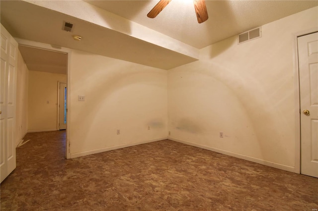 bonus room featuring ceiling fan, carpet, and a textured ceiling