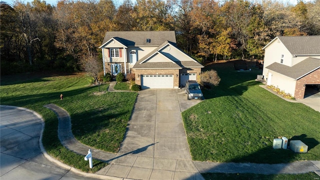 view of front of property featuring a garage and a front lawn