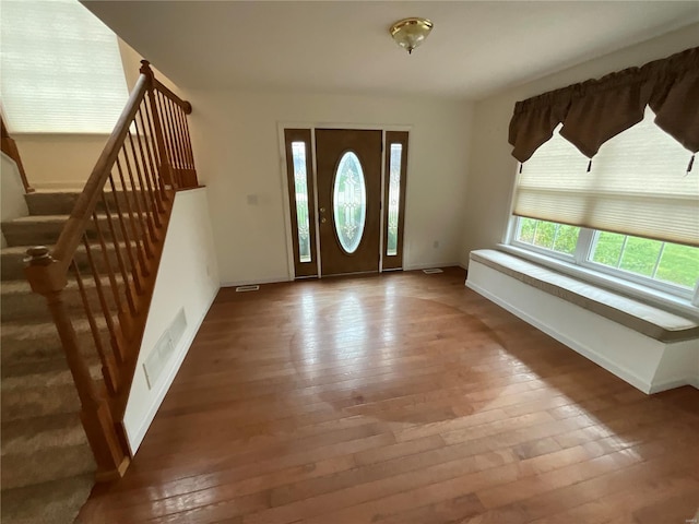 foyer featuring hardwood / wood-style floors