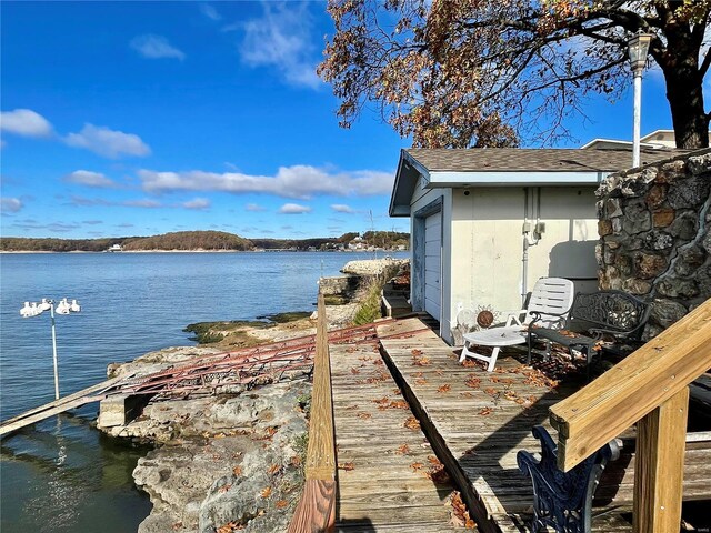 dock area with a water view