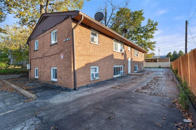 view of property exterior featuring cooling unit