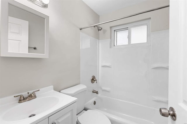 full bathroom featuring vanity, shower / bathing tub combination, and toilet