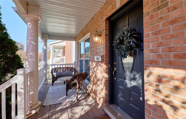 wooden terrace with covered porch