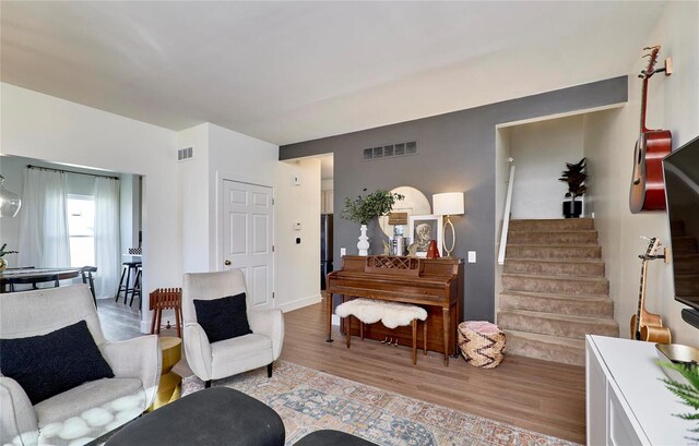 living room featuring light wood-type flooring