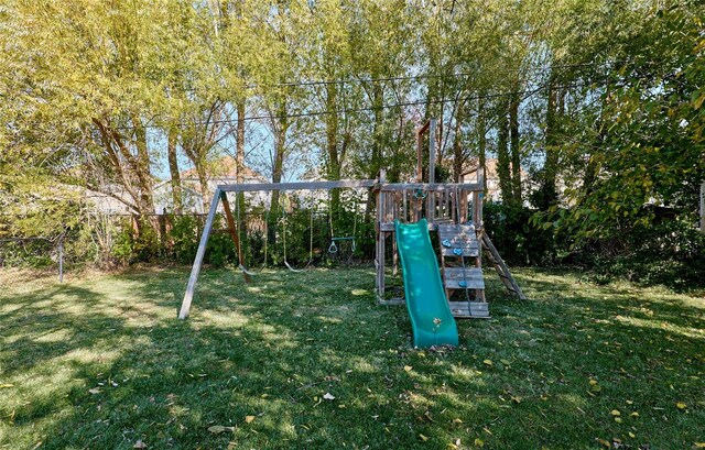 view of playground with a yard